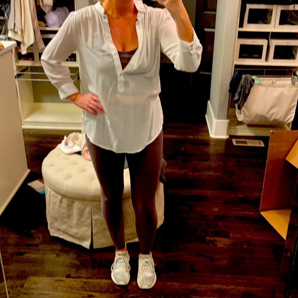 Brand new tags on white blouse. Long. Great condition.